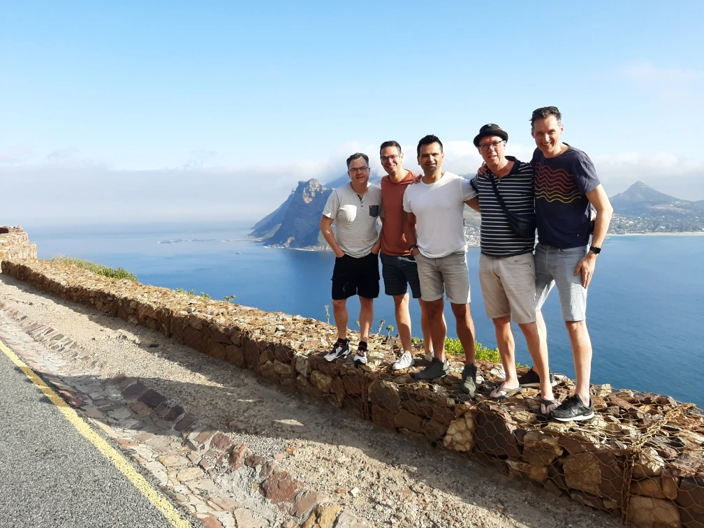 Happy tourists enjoying a private wine and dining experience with 4 C Sons Travelling in Cape Town